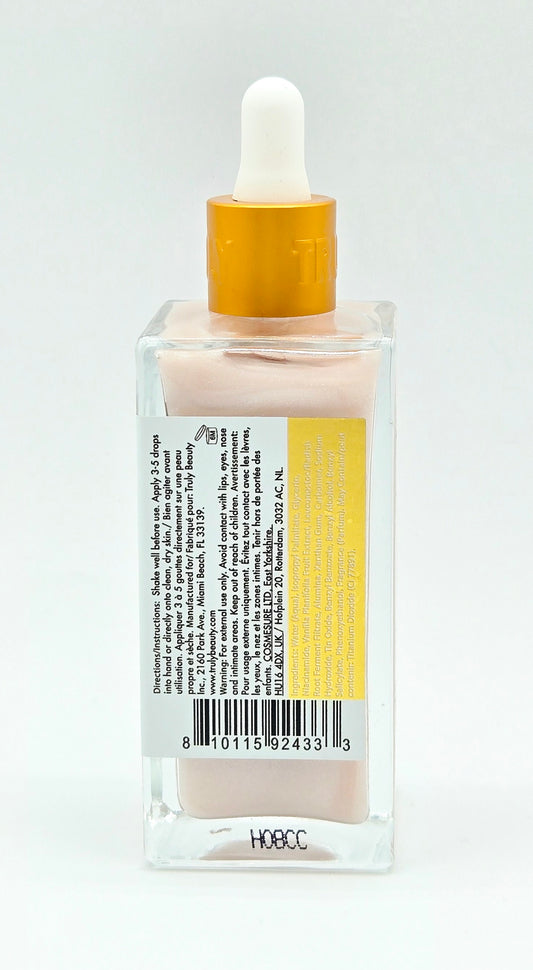Body serum bottle with dropper on a white background