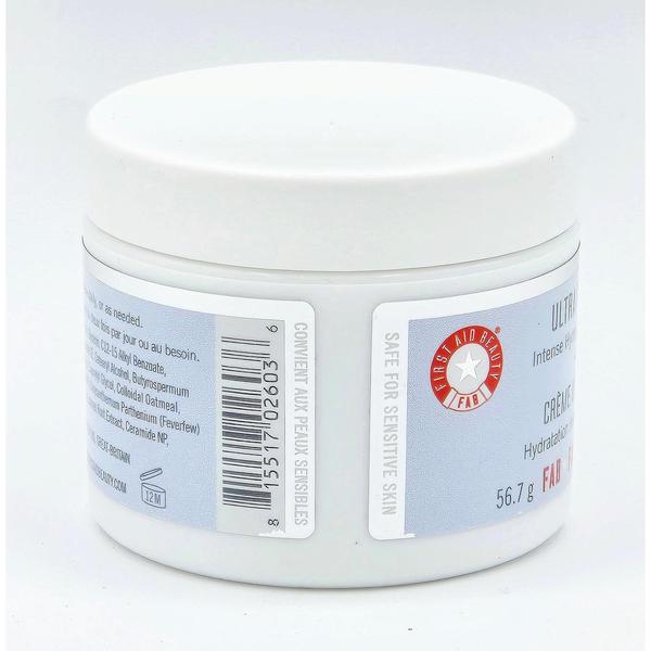 White jar of First Aid Beauty Ultra Repair Cream, 2 fl oz, with blue and white labels.