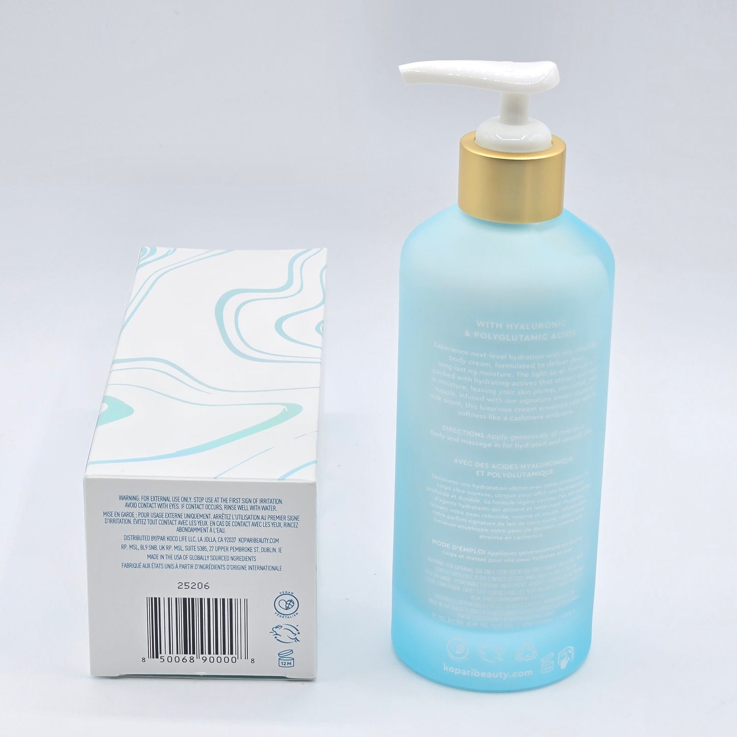 Kopari Hydrating Silk Body Cream, 6.6 fl oz, in a light blue pump bottle with a white and blue patterned box.