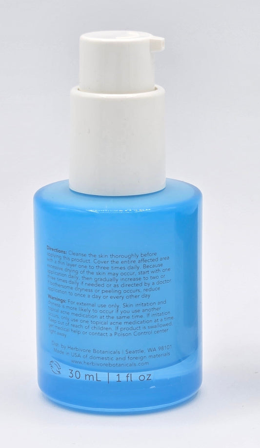 Blue bottle with print on white background