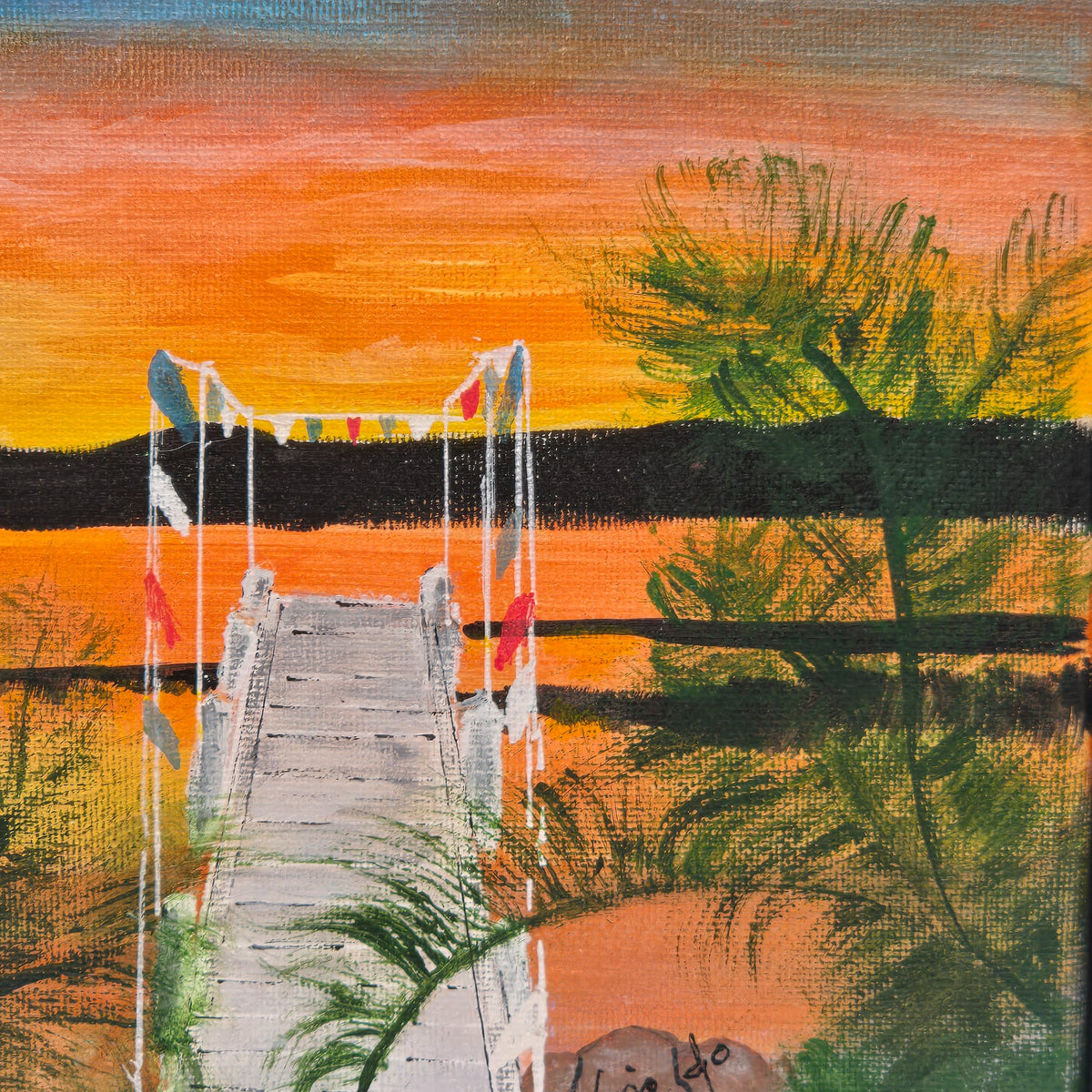 Detail of the dock, sunset reflections, shoreline tree, and Lisa Jo's signature in Mars Resort Pier