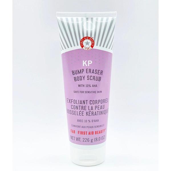 First Aid Beauty KP Bump Eraser Body Scrub 8 oz tube with purple label and gray stripes.