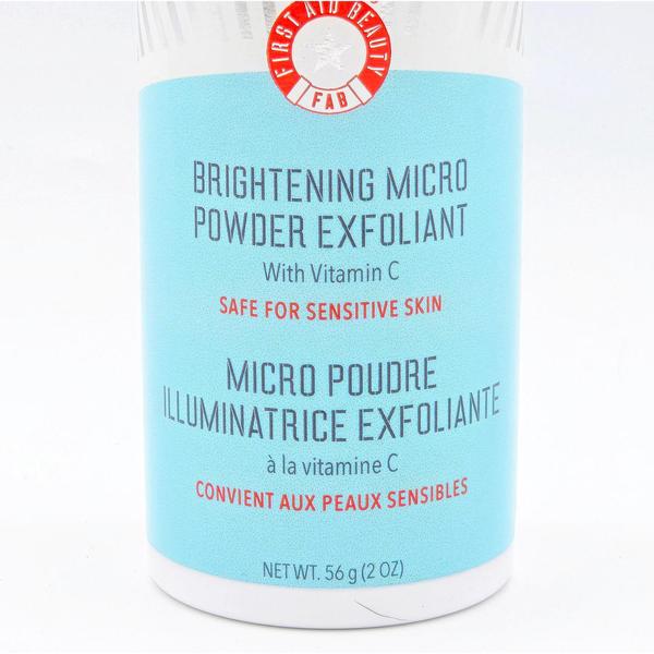 First Aid Beauty Brightening Micro Powder Exfoliant 2 oz bottle with blue label and red FAB logo.