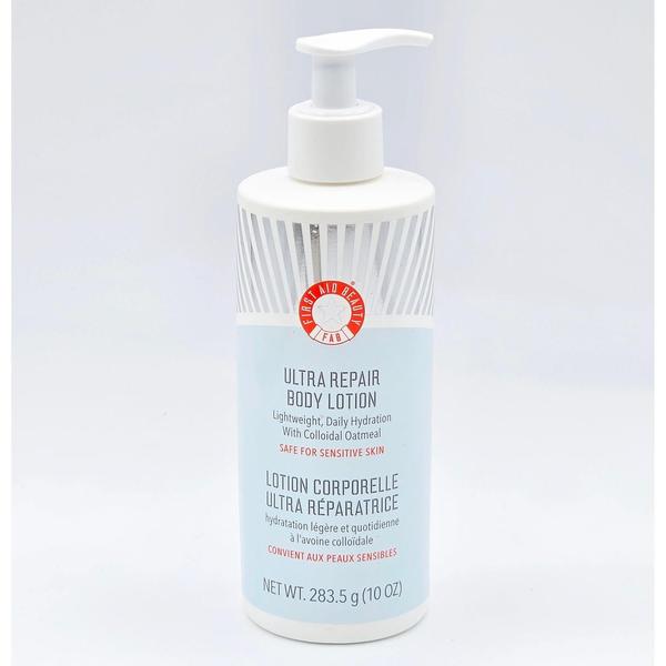 First Aid Beauty Ultra Repair Body Lotion, 10 fl oz white bottle with pump, blue and red label.