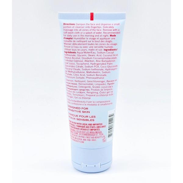 First Aid Beauty Ultra Gentle Cream-to-Foam Face Cleanser 2 oz tube, white with blue and red accents.