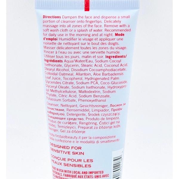 First Aid Beauty Ultra Gentle Cream-to-Foam Face Cleanser, 2 oz white tube with red text.
