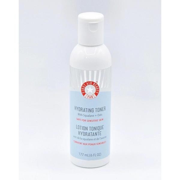White First Aid Beauty Hydrating Toner 6 fl oz bottle with blue label and red logo.