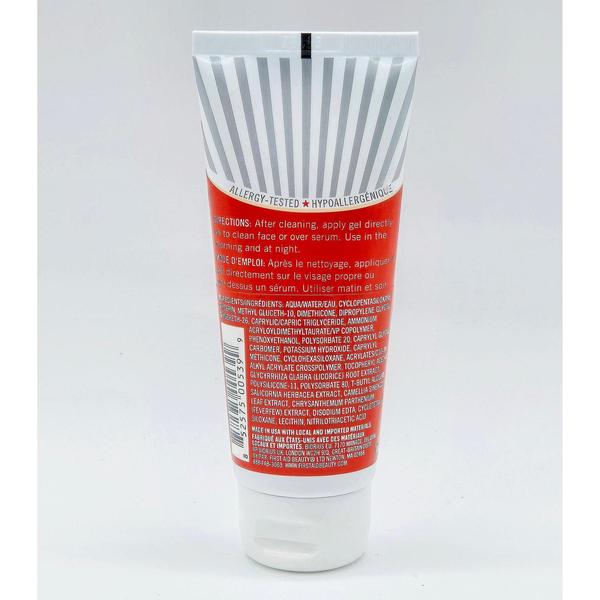 First Aid Beauty Skin Rescue Oil-Free Mattifying Gel tube with red and white striped design, showing product details.