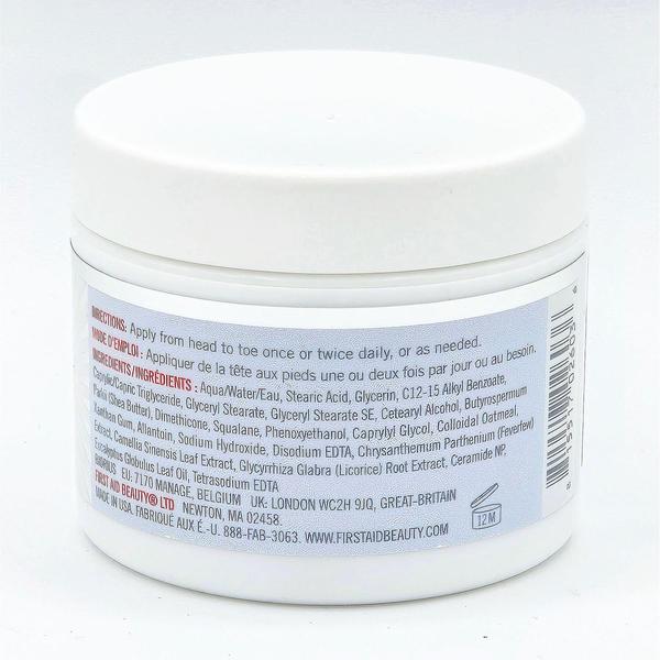 White First Aid Beauty Ultra Repair All Over Cream jar with a white lid, showing ingredients and directions.