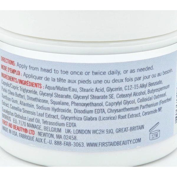 Close-up of First Aid Beauty Ultra Repair Cream jar with visible directions and ingredients list.