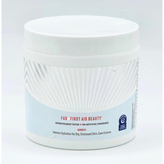 White First Aid Beauty Ultra Repair Cream 12 oz jar with blue label and "Intense Hydration" text.