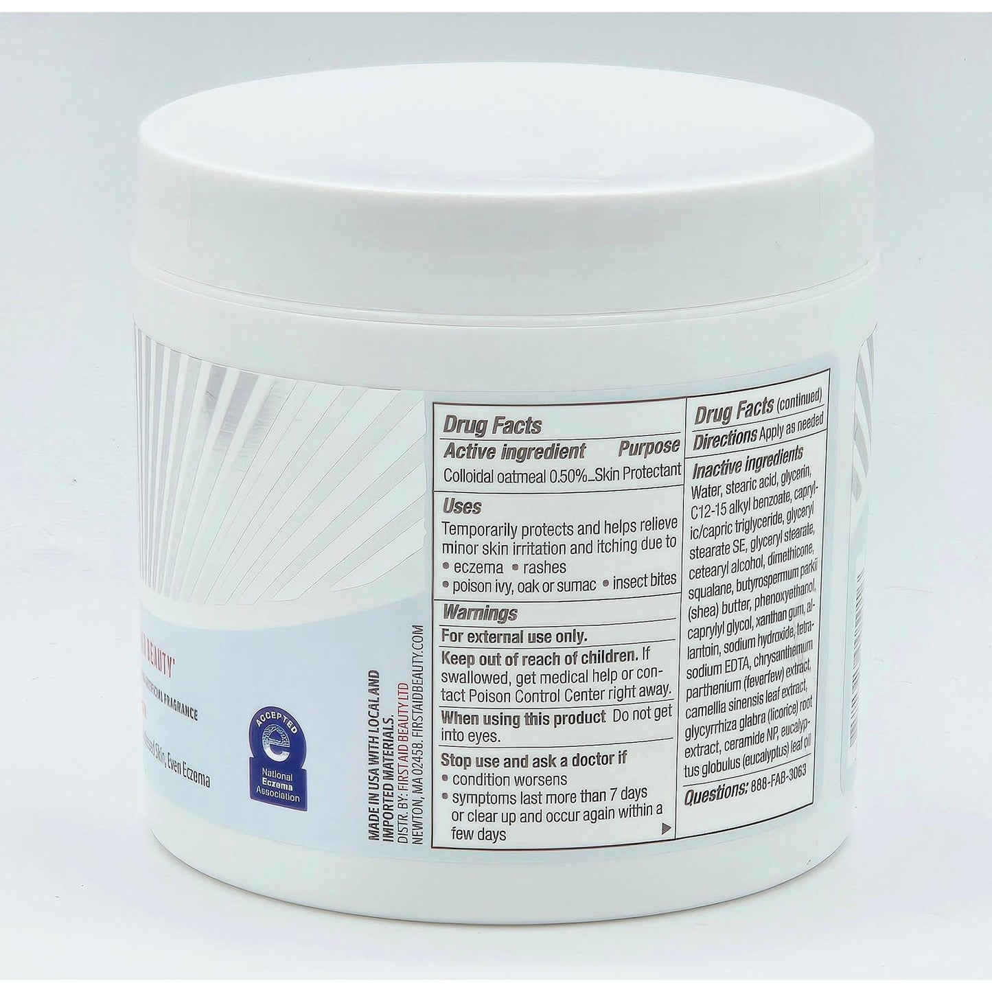 White First Aid Beauty Ultra Repair Cream 12 oz jar with visible drug facts label.