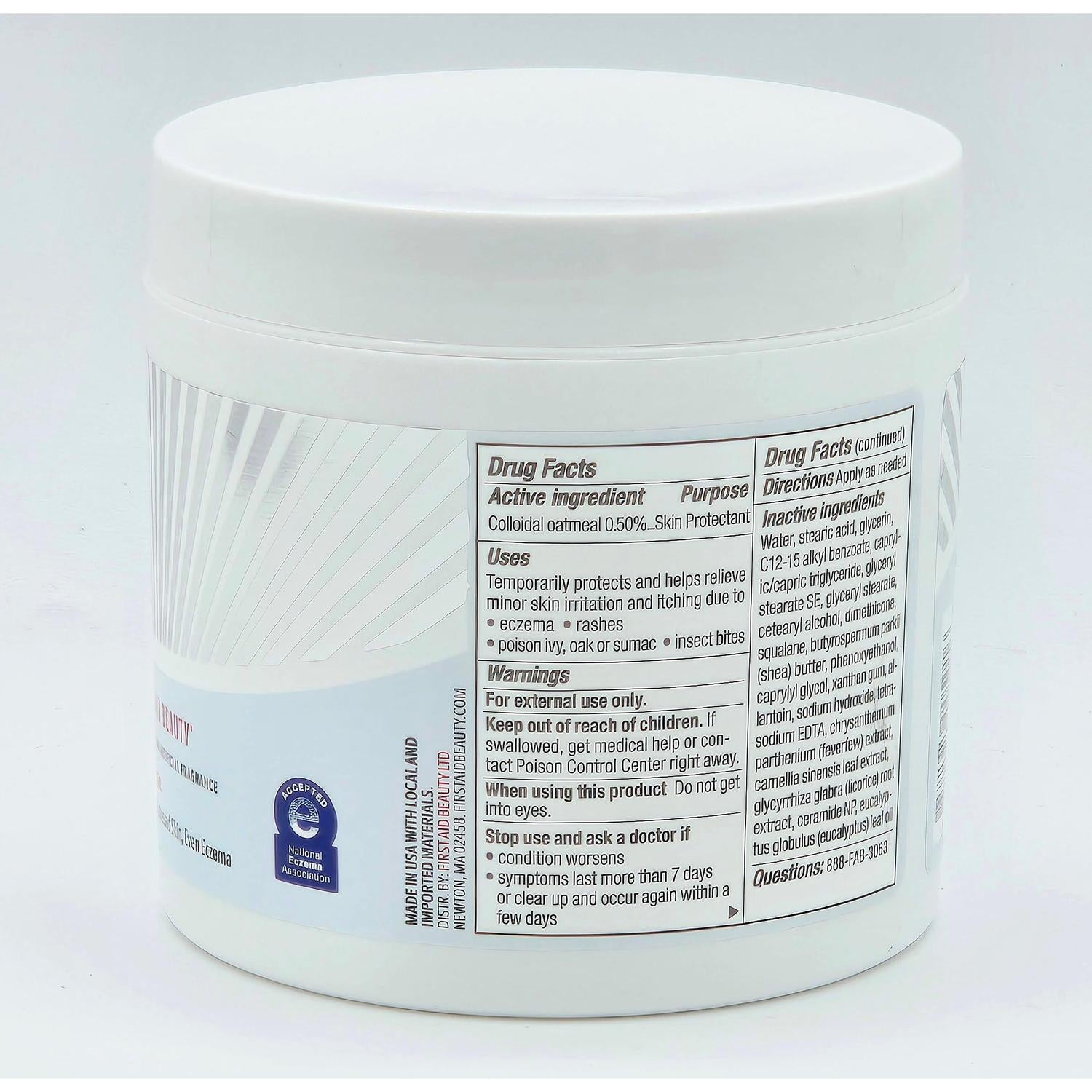 White First Aid Beauty Ultra Repair Cream 12 oz jar with visible drug facts label.