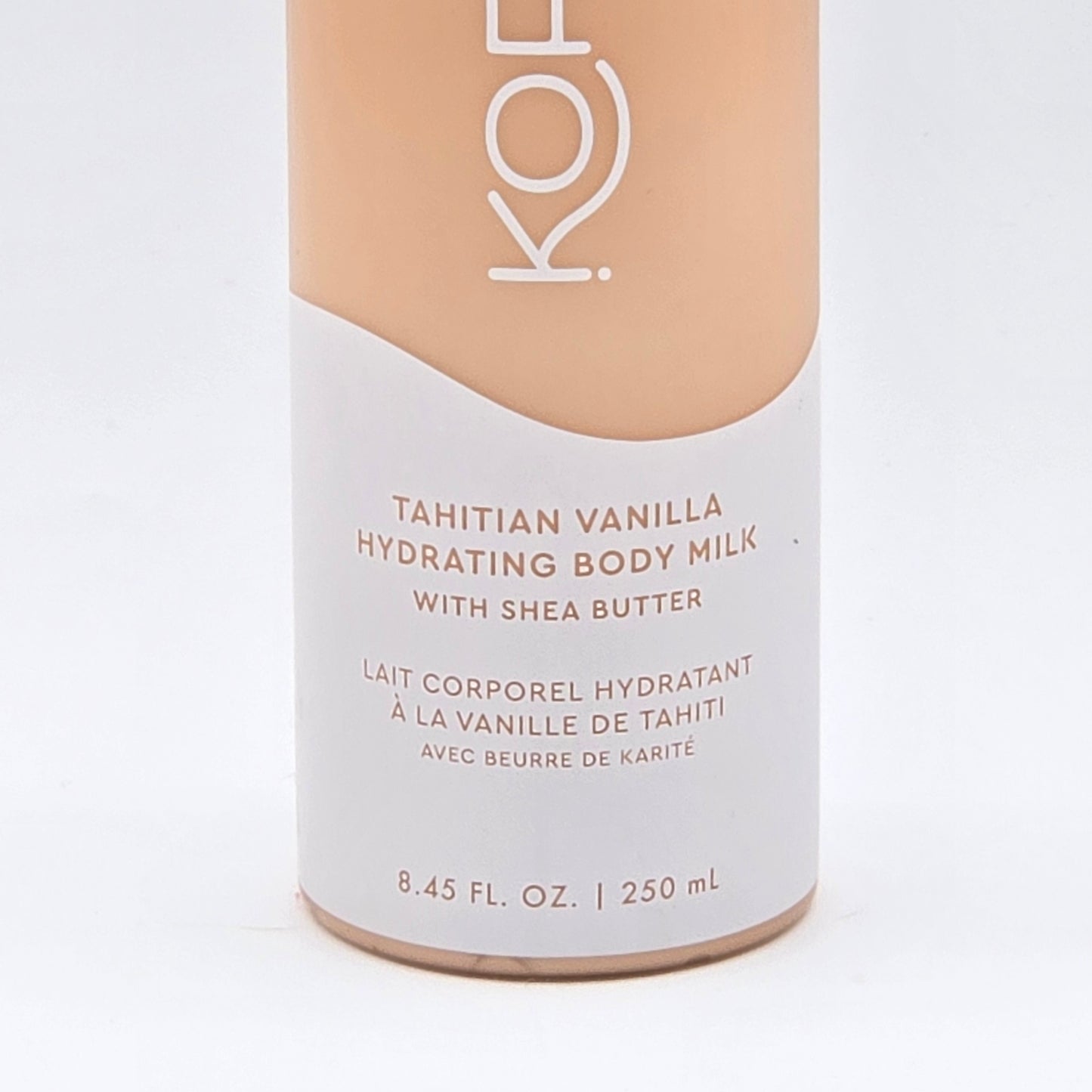 Kopari Tahitian Vanilla Hydrating Body Milk, 8.45 fl oz, in a peach and white bottle.