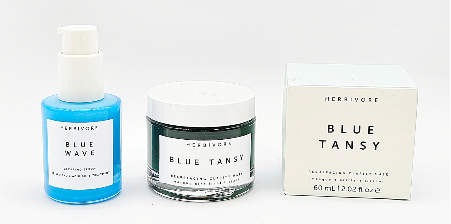 Herbivore Blue Wave and Blue Tansy skincare products on a white background