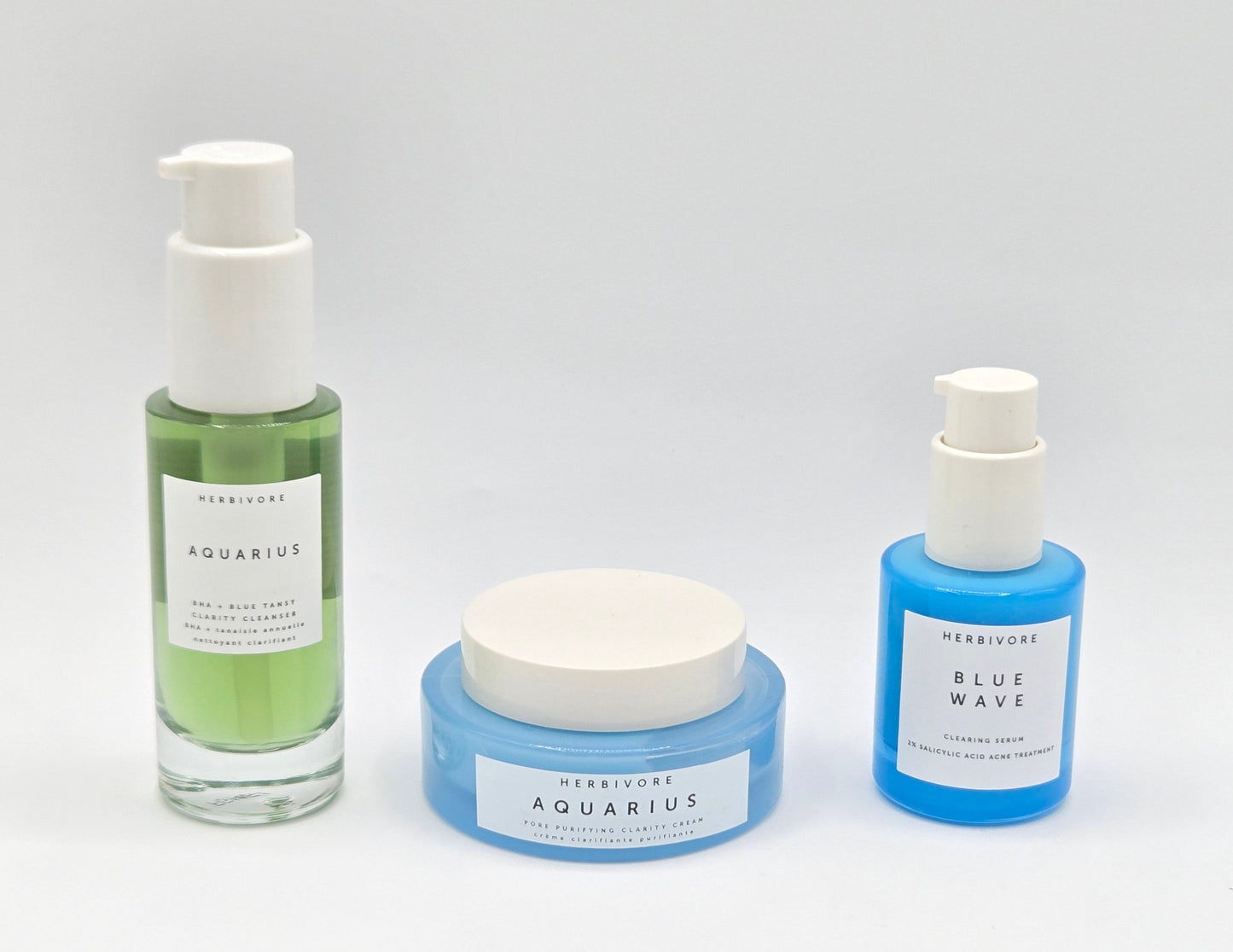 Three skincare products from Herbivore on a white background