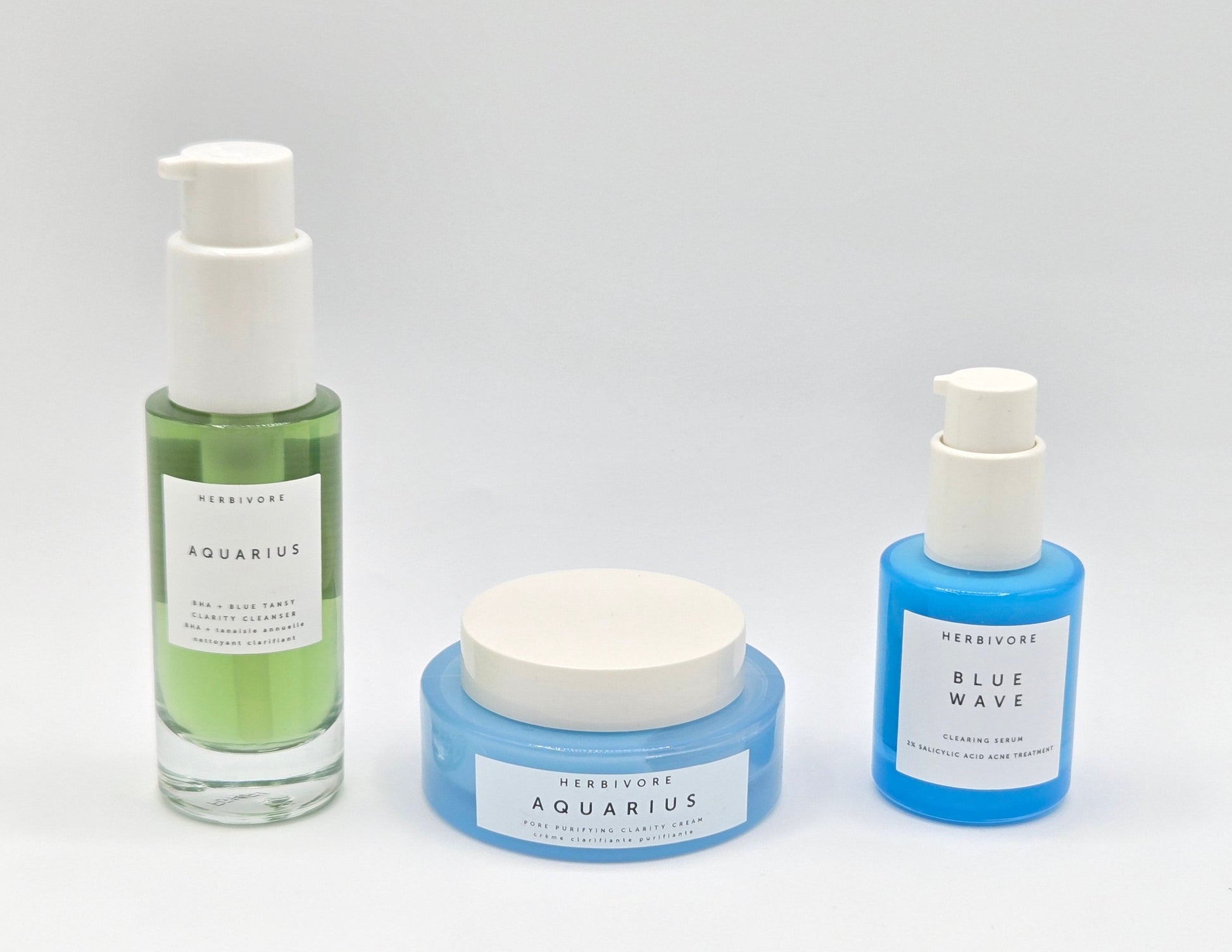 Three skincare products from Herbivore on a white background
