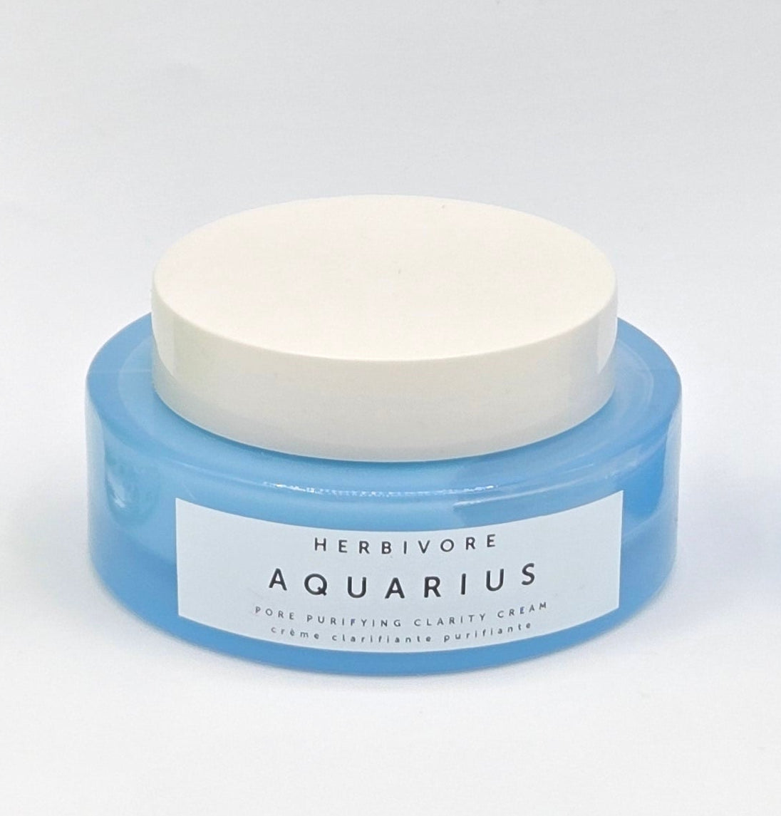 Blue Herbivore jar on white background