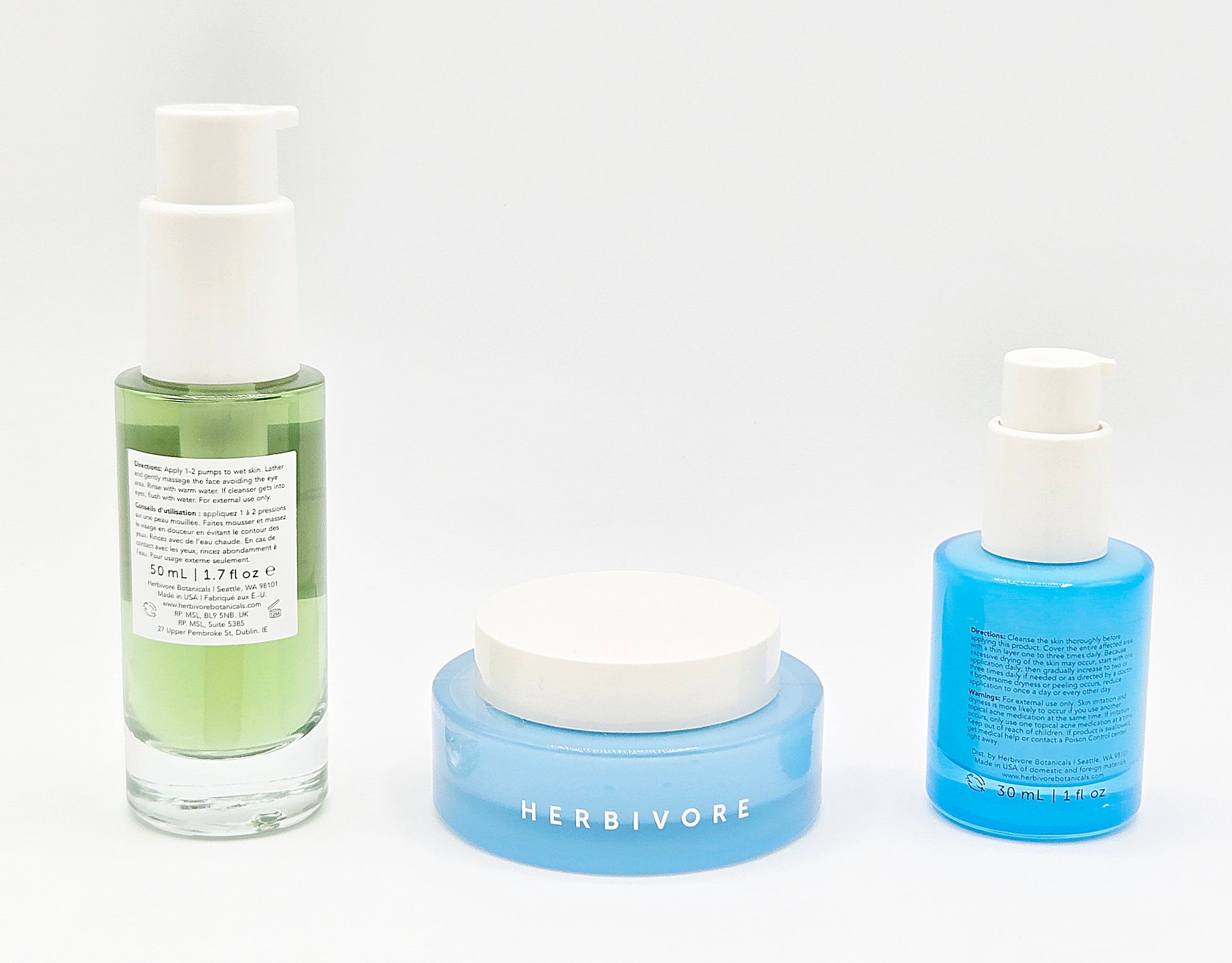 Three skincare products from Herbivore on a white background