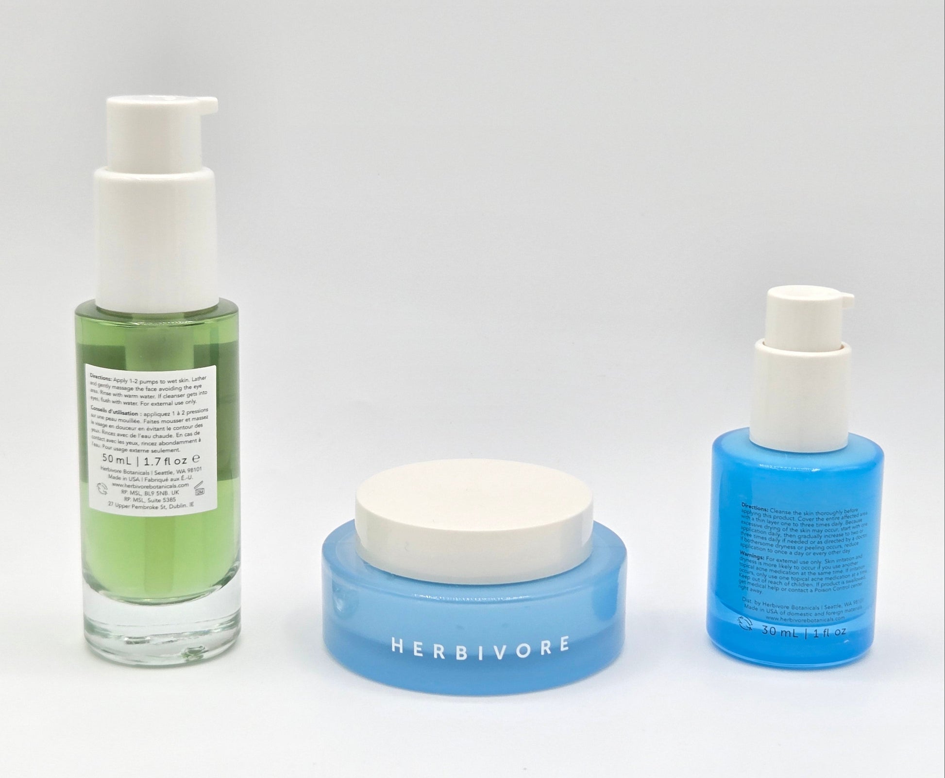 Three skincare products from Herbivore on a white background