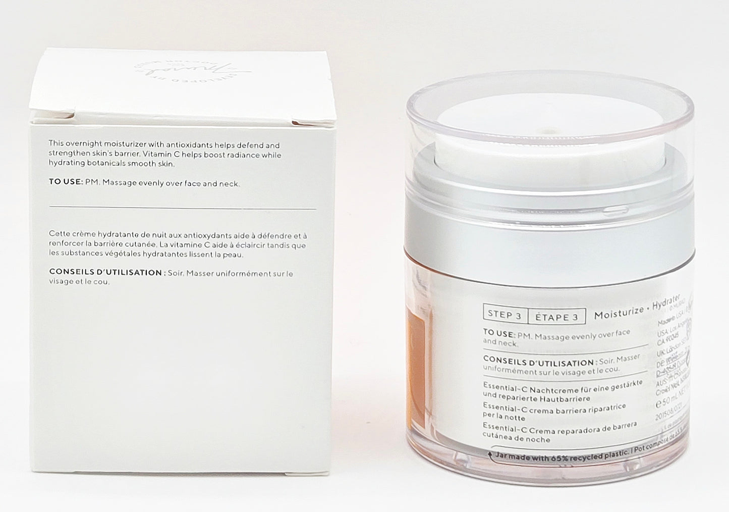 Skincare product jar with white packaging on a white background