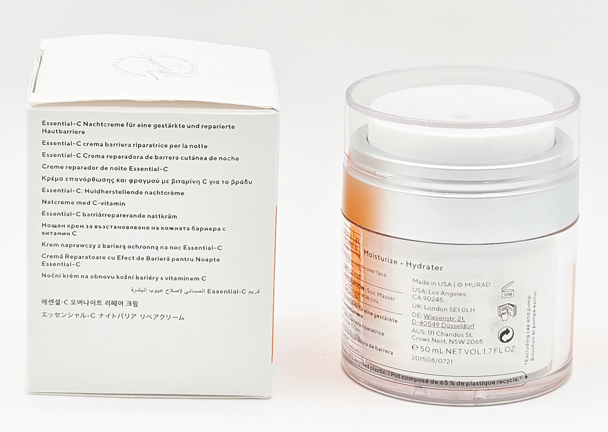Jar of skincare cream with its packaging on a white background