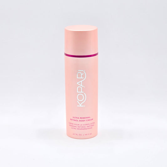 Kopari Ultra Renewal Retinol Body Cream, 4.7 fl oz, in a tall, light pink pump bottle with a darker pink band.