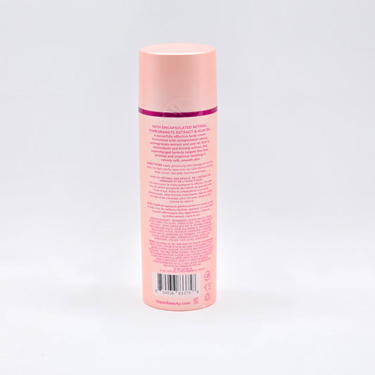Kopari Ultra Renewal Retinol Body Cream, 4.7 fl oz, in a peach-colored bottle with a pink cap.