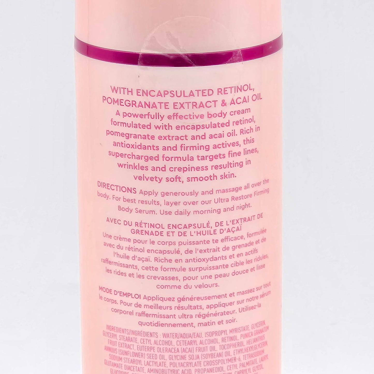 Kopari Ultra Renewal Retinol Body Cream, a pink bottle with product details in English and French.