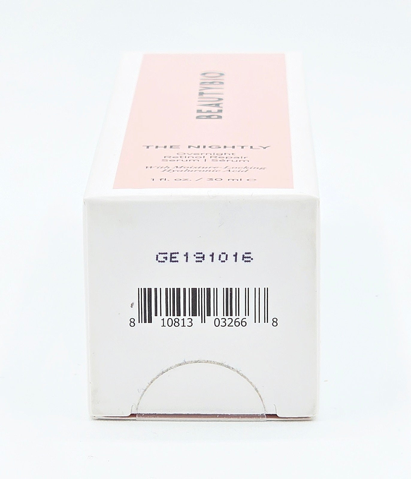 Product packaging with a pink label and barcode on a white background