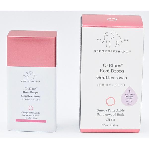 Drunk Elephant O-Bloos Rosi Drops, a white bottle with a pink cap next to its pink and white box.