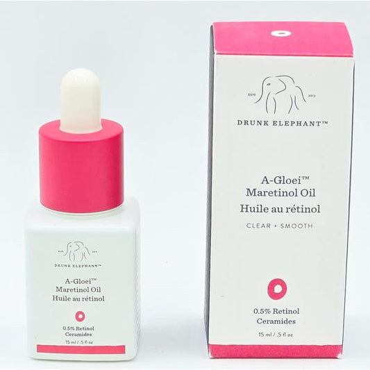 Drunk Elephant A-Gloei Maretinol Oil: white bottle with pink dropper and matching box, 15ml.