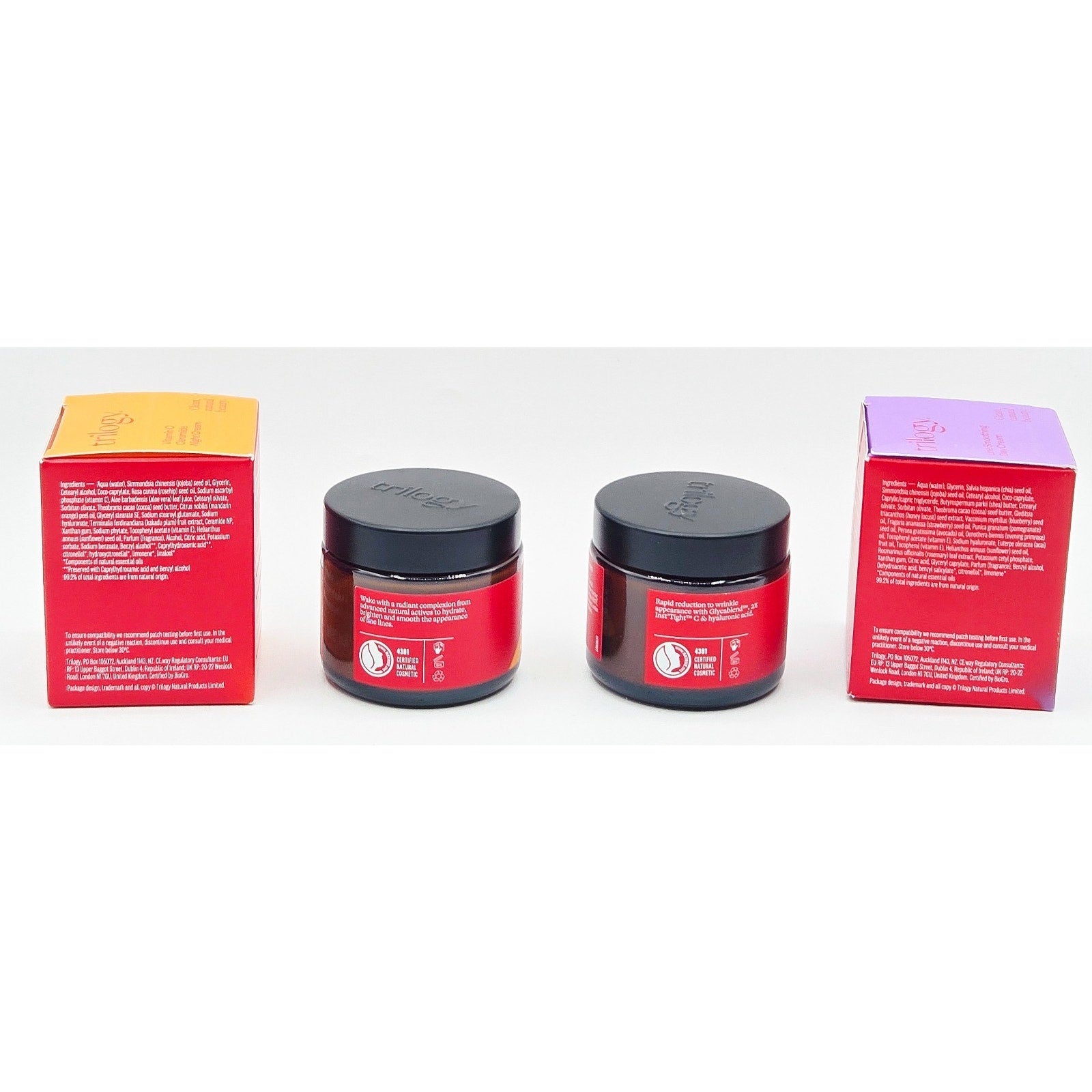 Two red jars with black lids and two red boxes on a white background