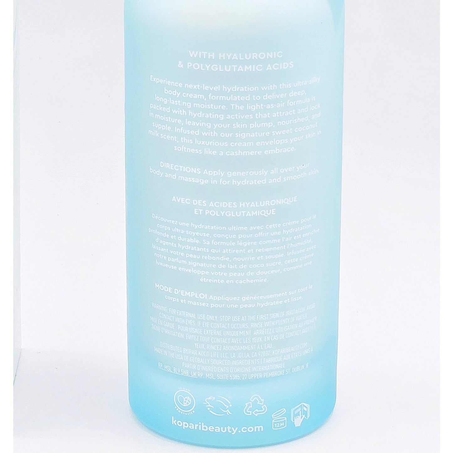 Close-up of Kopari Hydrating Silk Body Cream rear label with directions, warnings and 12M PAO
