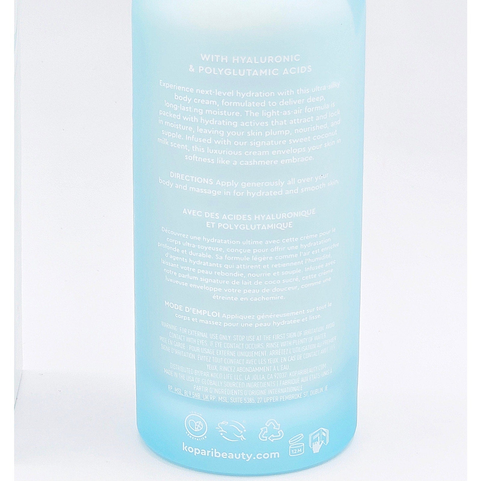 Close-up of Kopari Hydrating Silk Body Cream rear label with directions, warnings and 12M PAO