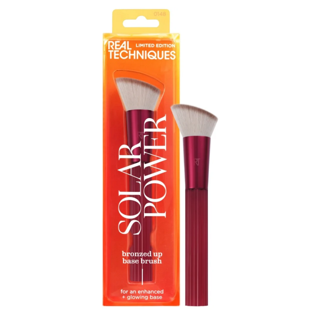 Solar Power Bronzed Up Base Brush beside its limited-edition packaging