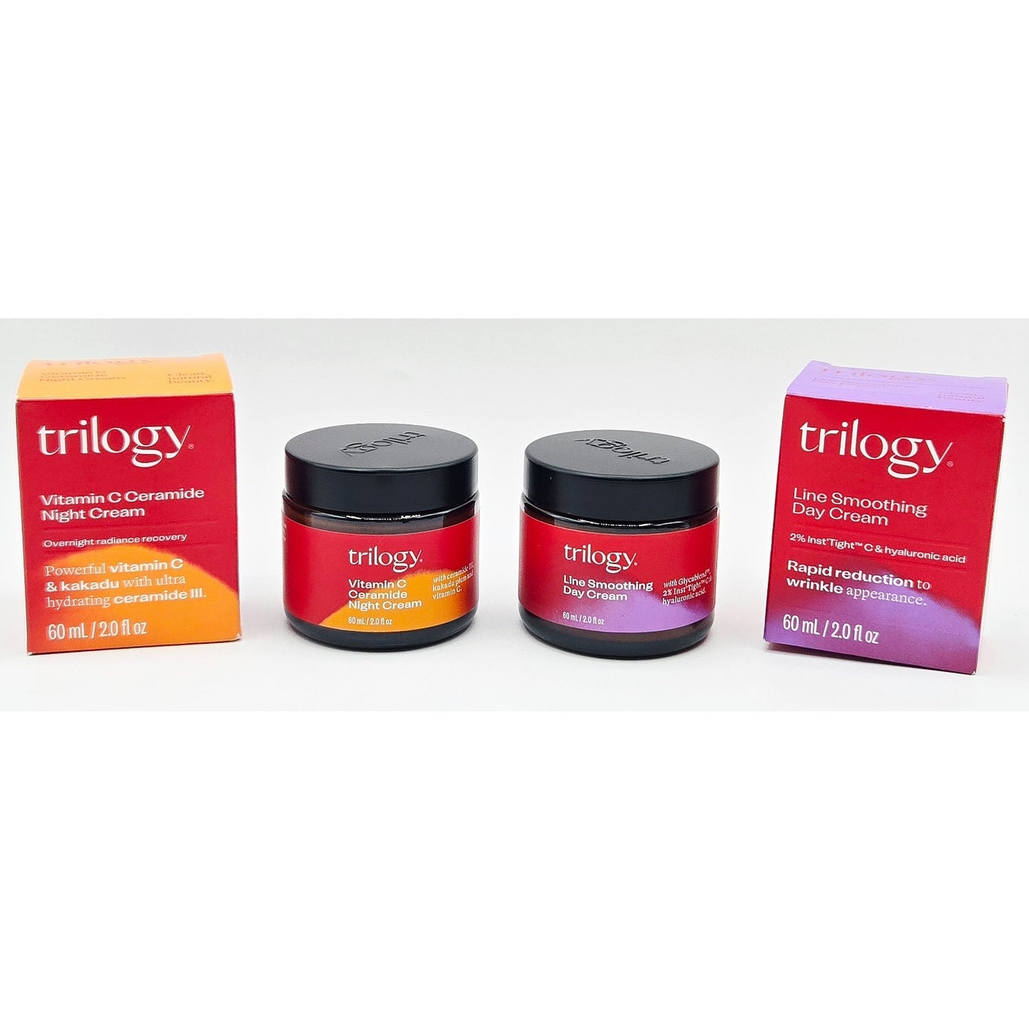 Trilogy skincare products including jars and boxes on a white background