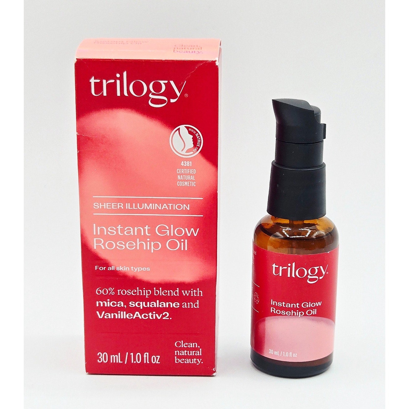 Trilogy Instant Glow Rosehip Oil bottle and packaging on a white background