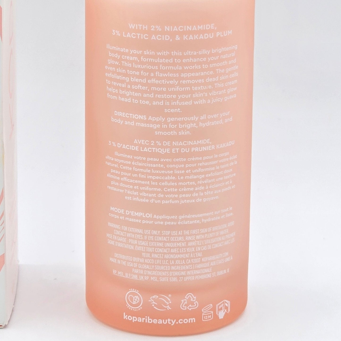 Close-up of Kopari Brightening Silk Body Cream rear label with directions, warnings and 12M PAO