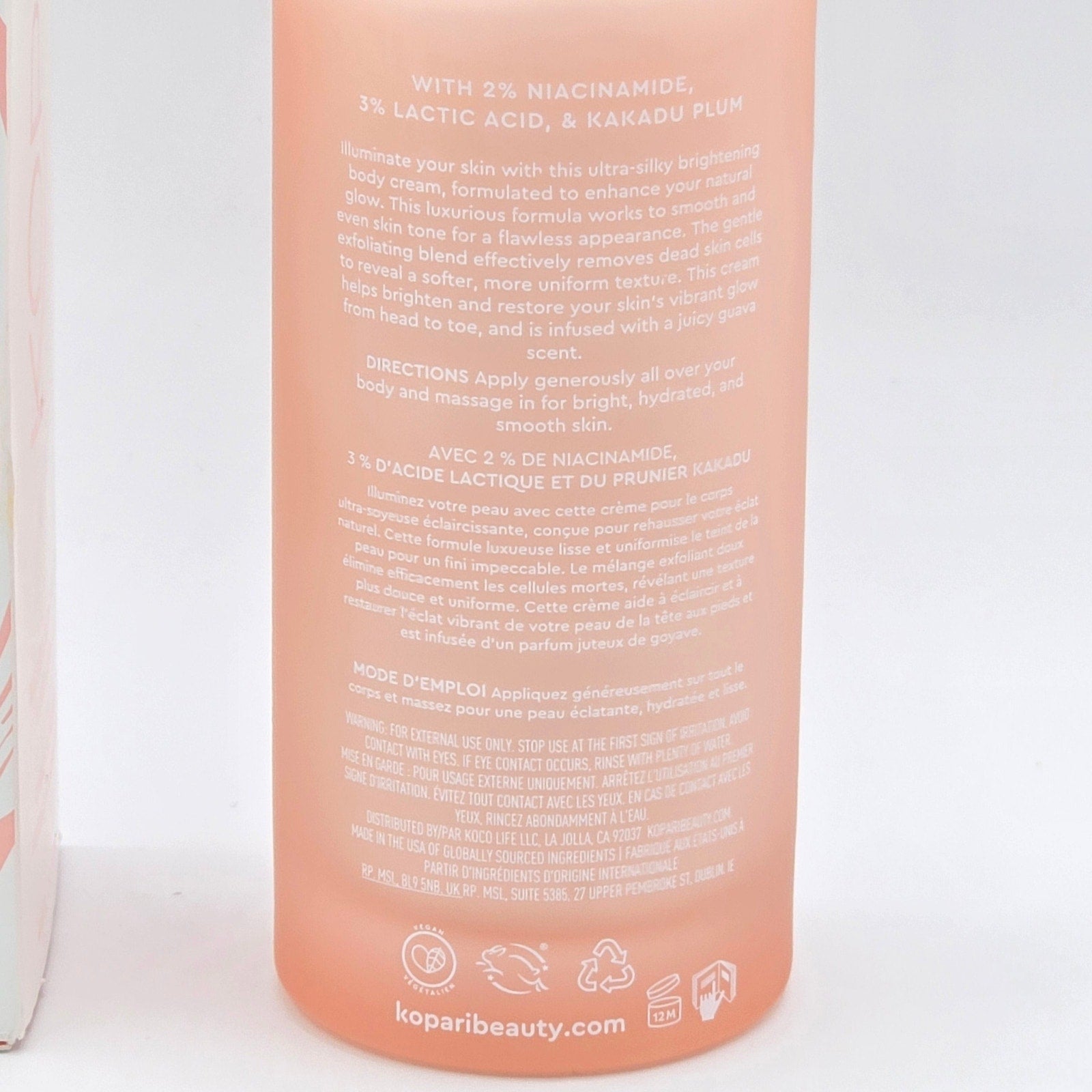 Close-up of Kopari Brightening Silk Body Cream rear label with directions, warnings and 12M PAO