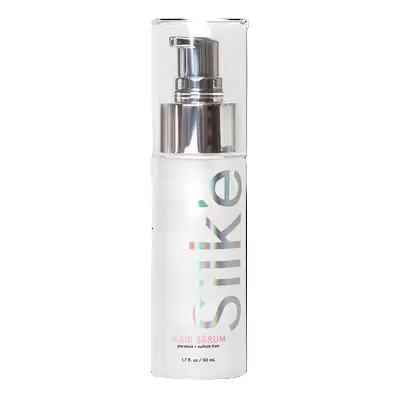 Sleek’e Silk’e Repair Therapy Hair Serum 50 mL bottle with silver pump and clear cap on white