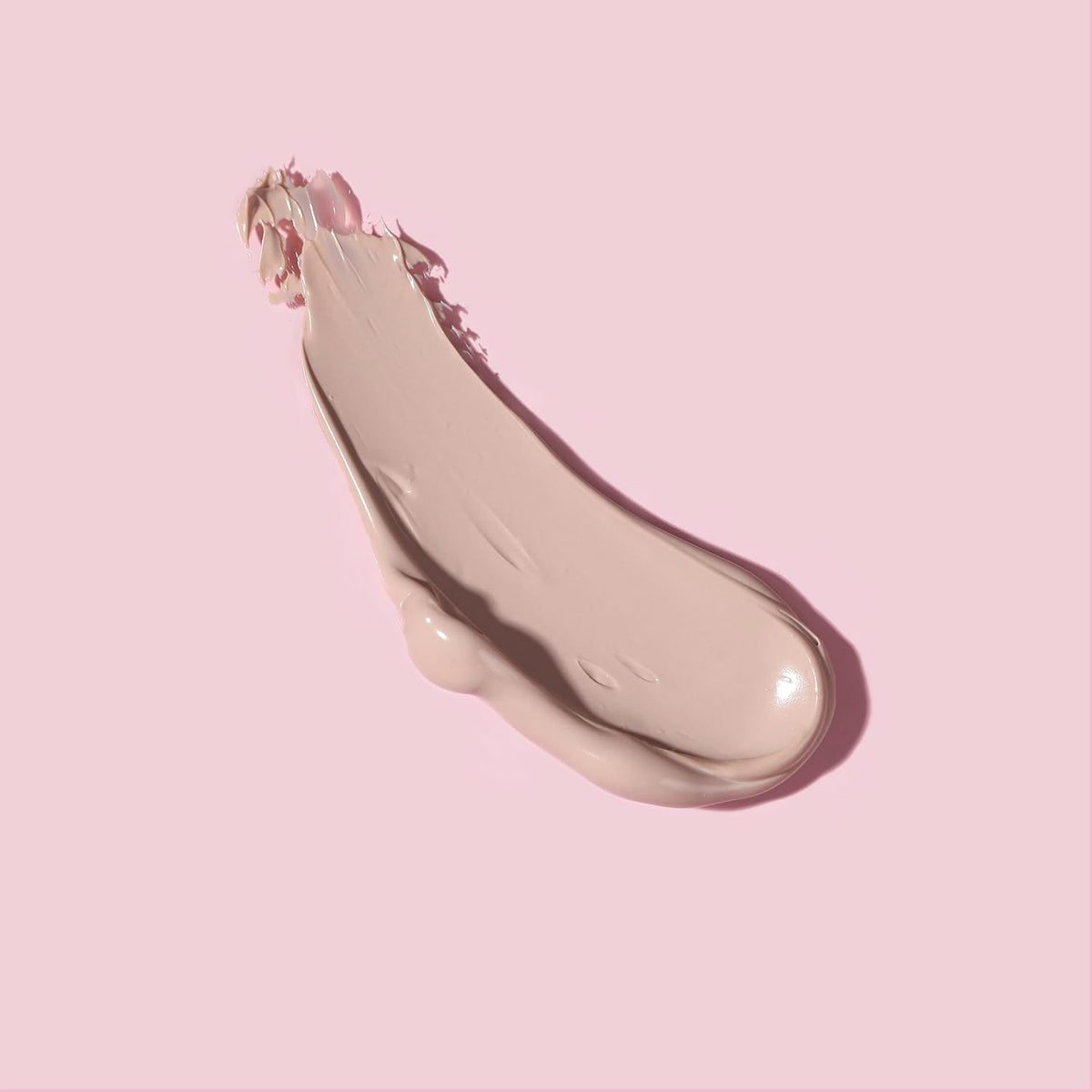 Tinted creamy swatch of Naked Sundays Collagen Glow sunscreen