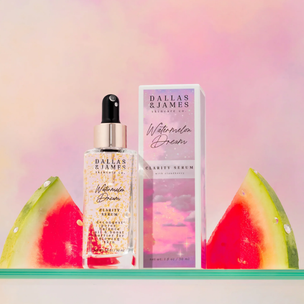 Dallas & James Clarity Serum and pink carton displayed beside watermelon slices