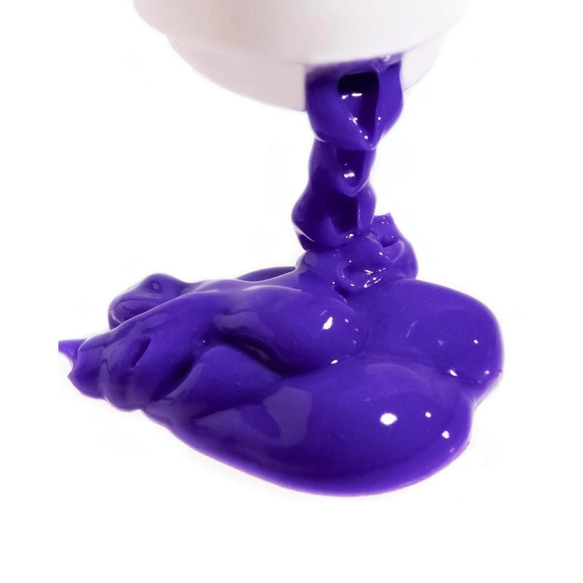 Close-up of rich violet IGK Blonde Pop Purple Toning Conditioner flowing from a white bottle.