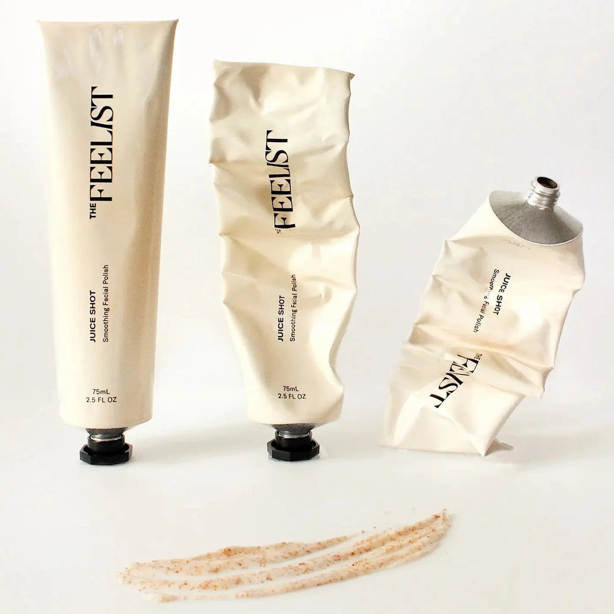The Feelist Juice Shot tubes shown at different stages of use beside a polish swatch