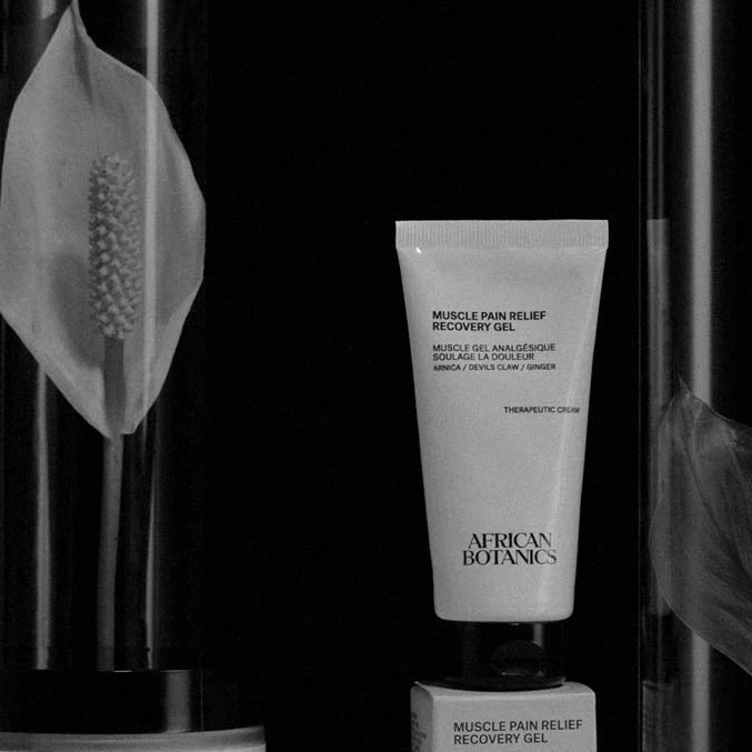 African Botanics Recovery Gel tube and carton in a dark botanical display