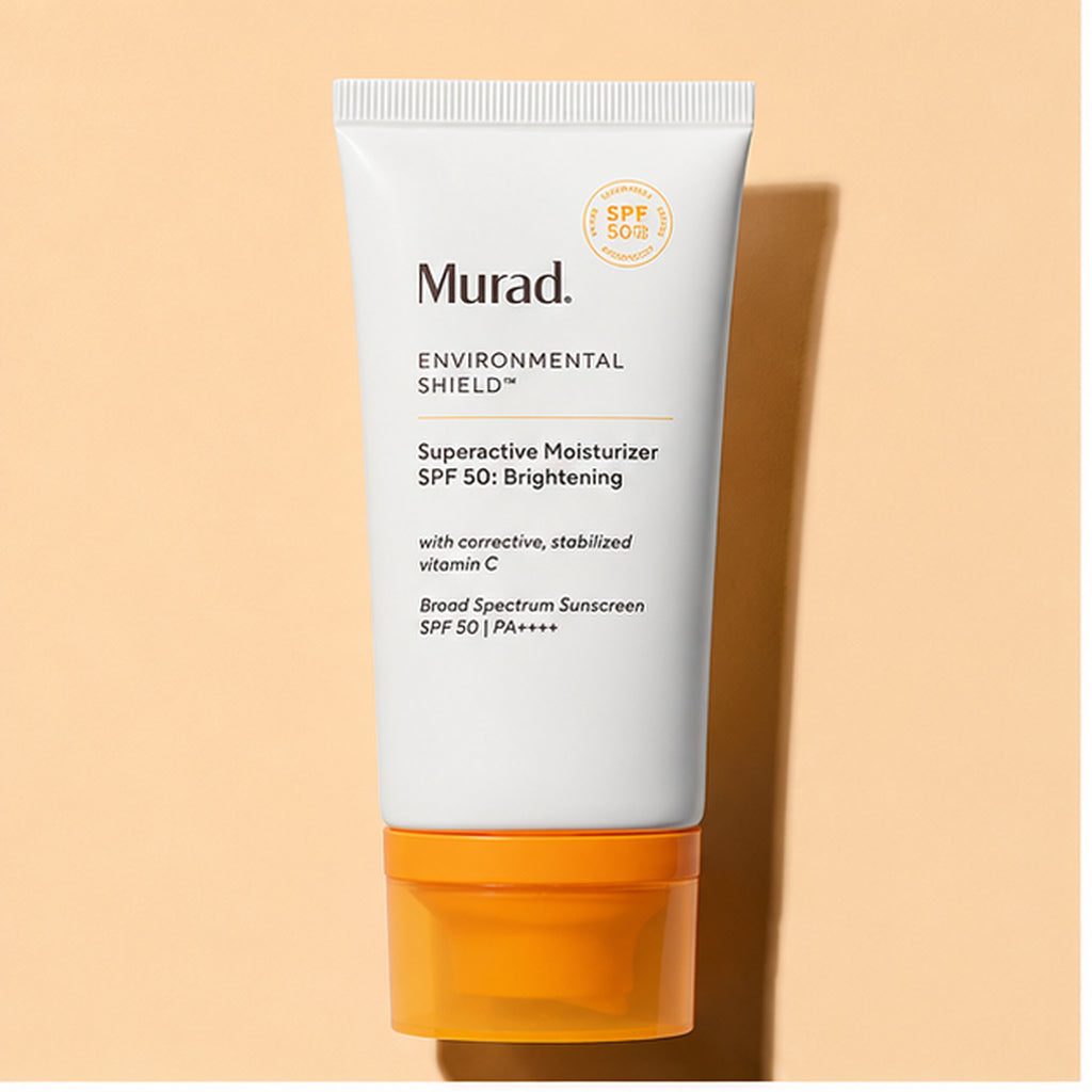 Murad Superactive Moisturizer SPF 50 white and orange tube on a peach background