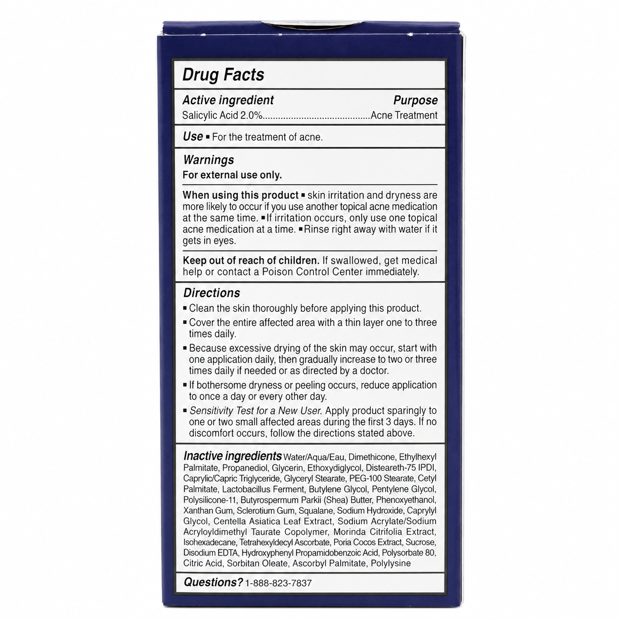 A tall, narrow blue box shown from the back, featuring a large white Drug Facts panel with black text detailing the active ingredient Salicylic Acid 2.9% and directions for use.
