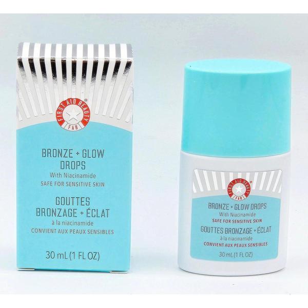 First Aid Beauty Bronze + Glow Drops with Niacinamide, a white bottle with a light blue cap, next to its matching box.