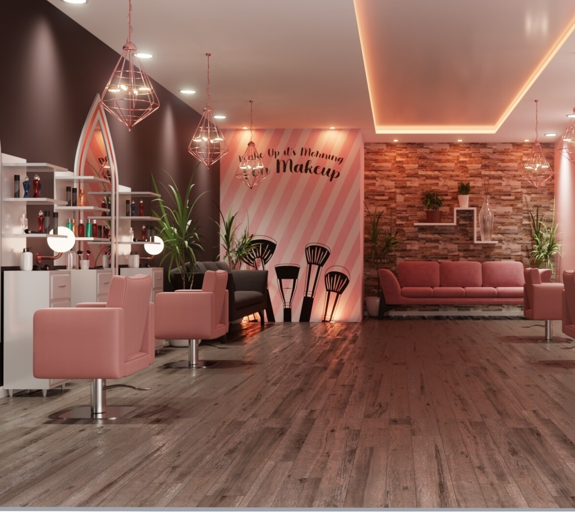 Rose-toned beauty salon interior with styling chairs and oversized makeup-brush wall decor.